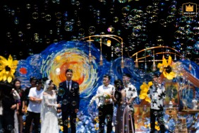 At an outdoor wedding ceremony in Taiyuan, Shanxi, audience members use bubble machines to release bubbles throughout the seating area.